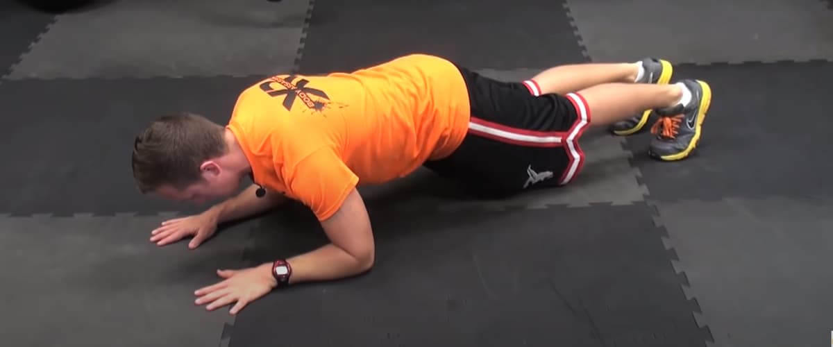 Plank tricep extension